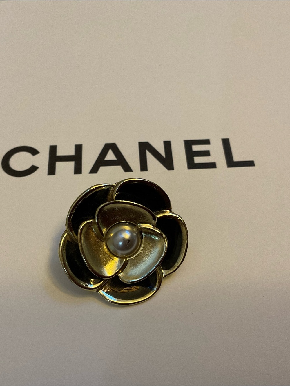 CHANEL Black and Gold Camellia Charm with Oearl Accent. AUTHENTIC